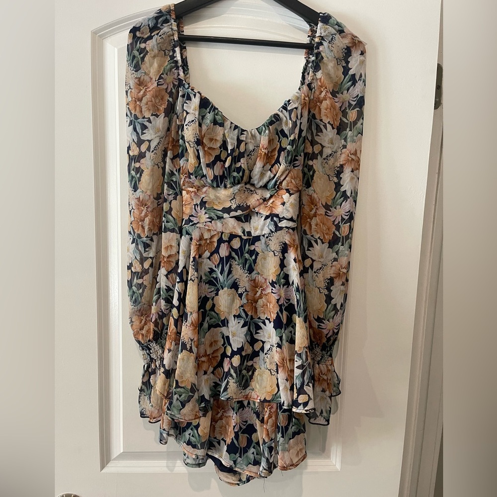 Floral long sleeve Romper in size L